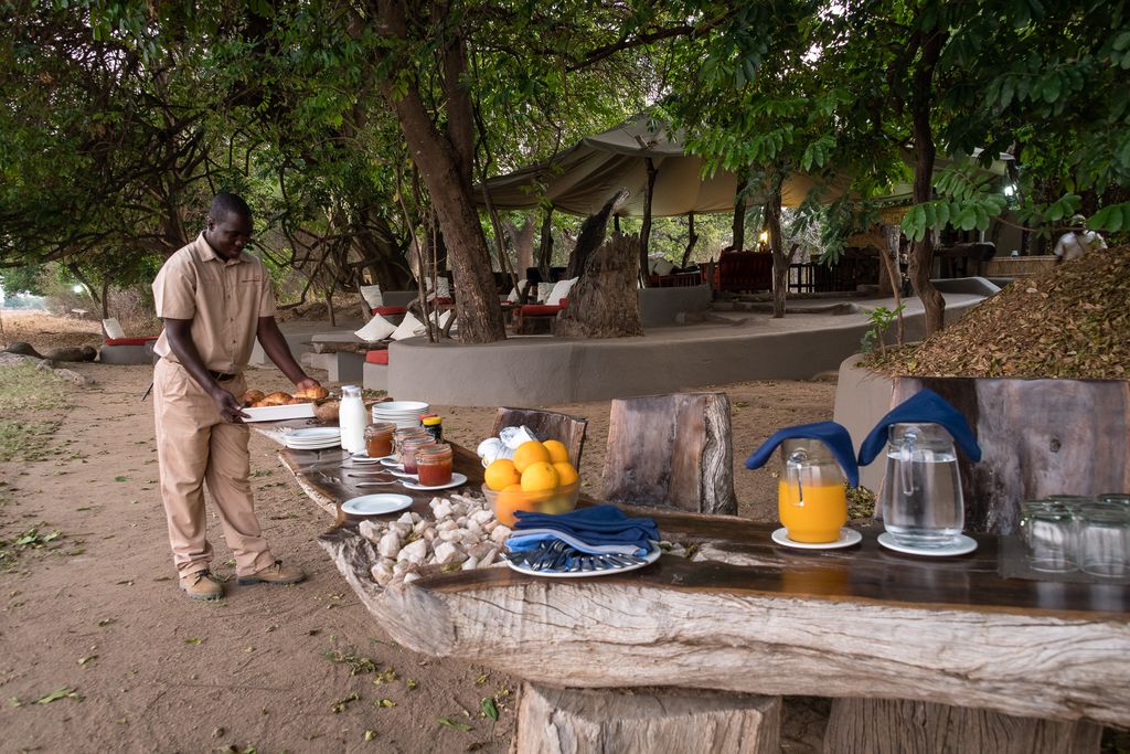 The Camp Tena Tena team preparing fresh local food and drinks in the heart of the bush.