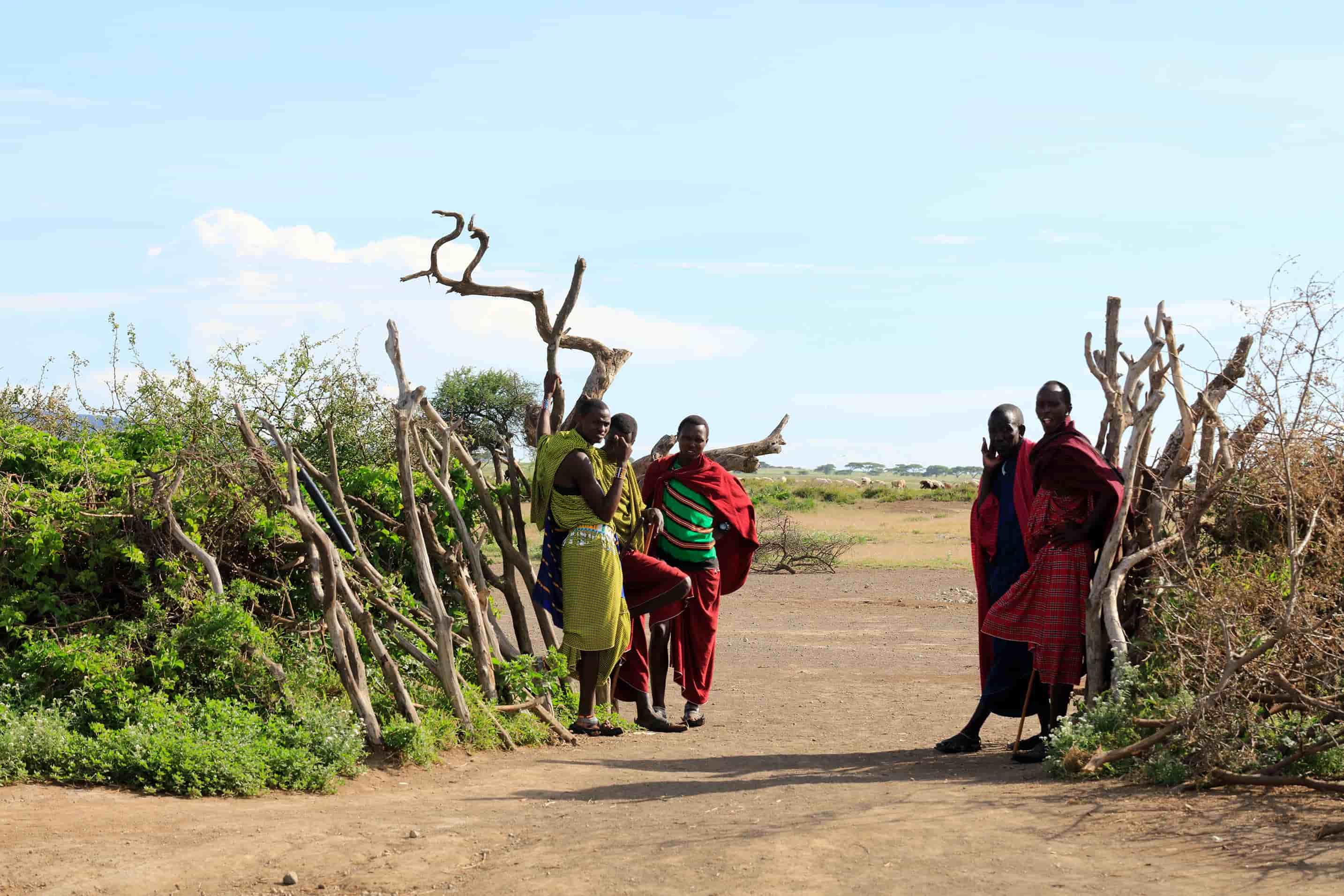 Locals in Maasai village wearing their traditional clothes.