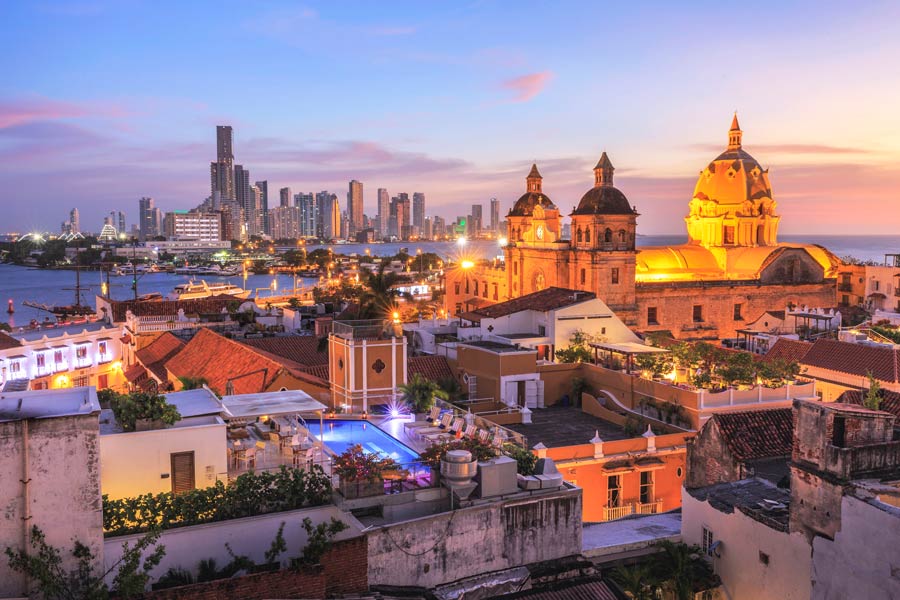 Sunset view of Cartagena’s historic centre and cathedral, the final destination of the AmaMagdalena river cruise in Colombia.