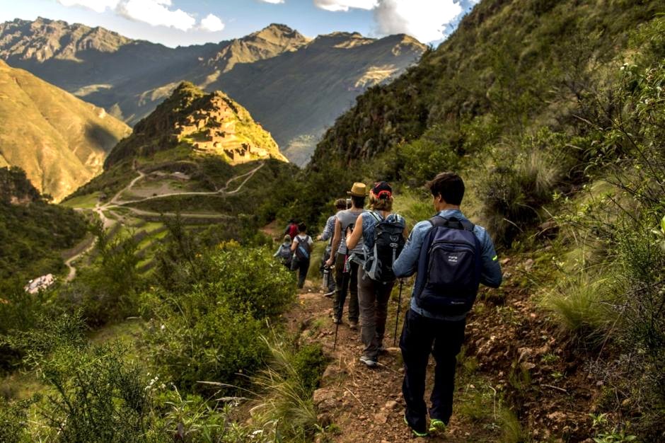 Hikers making their way up the mountain trail.