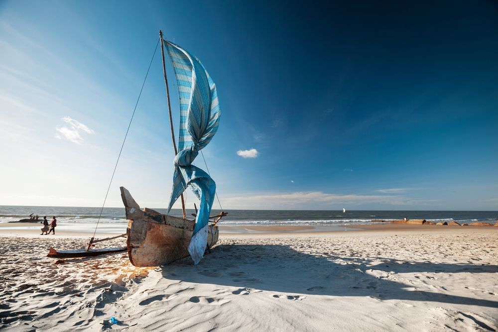 Traditional Malagasy sail boat on the sea coast. Town of Morondava, Madagascar.